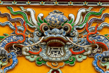 view of the Imperial City with the Purple Forbidden City within the Citadel in Hue, Vietnam. Imperial Royal Palace of Nguyen dynasty. Travel and landscape concept