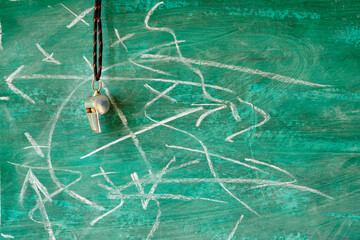  soccer tactics scribble on blackboard and whistle of soccer referee or trainer. Great soccer event...