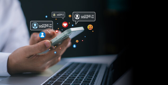 Connect with social media network via smartphone, Women hand using smartphone typing, Chatting conversation in chat box icons pop up, Social media marketing concept, Live Chat Chatting on application.