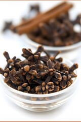 Obraz premium Closeup Aromatic Cloves in Glass Bowl, Spice Photography