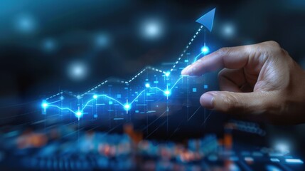 A hand is pointing at a graph that shows a rising line