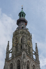 Obraz premium Abseilers descend from the historic church tower in a thrilling display of skill and courage