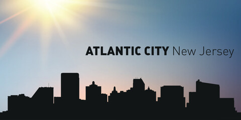 Cityscape, architecture, silhouette of the city of Atlantic, New Jersey on the background of the sunset.  © Dima