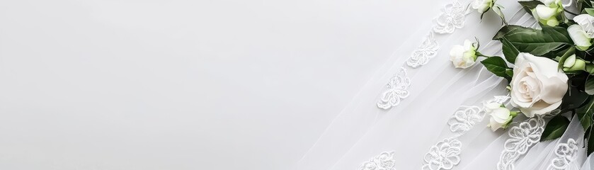 Elegant wedding floral arrangement with lace veil