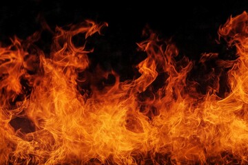 Fototapeta premium Blazing Flames Dancing Against Black Backdrop in a Fiery Display of Heat and Energy