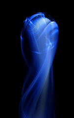 Swirl Stage. Neon glowing circles. Light Trails. Glint bright spiral. Motion ellipse..Slow shutter light trajectory. Long shiny tape. Accelerate twisted ribbon. Glowing dynamic lines.