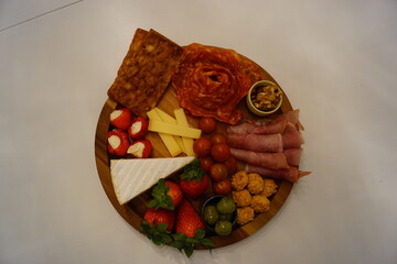 Delicious tapas platter with charcuteries and cheese boards