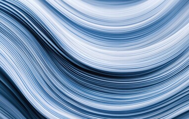 An abstract image featuring flowing lines in shades of blue, creating a sense of movement and fluidity.