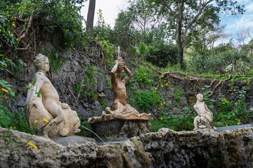 Baroque stone statues in Bellini Garden in Catania historic public park