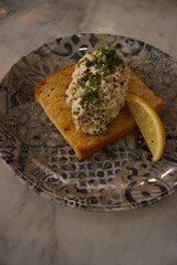 A modern Swedish style toast skagen with crayfish salad on bread
