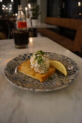 A modern Swedish style toast skagen with crayfish salad on bread