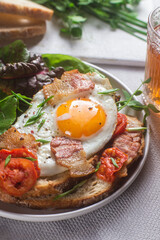 Breakfast. Scrambled eggs with toast and lettuce