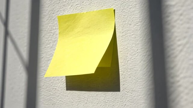 Yellow sticky note on the wall.