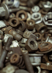 old rusty screws, nuts and bolts with dust grunge style