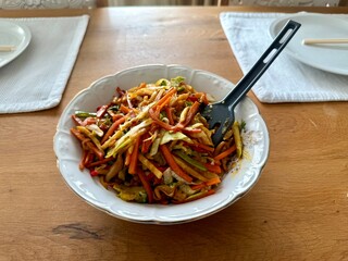 Vitamin fresh vegetable salad julienne chinese style with chopsticks