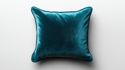 Realistic image of a plush velvet throw pillow in a deep teal color, square shape with piped edges, viewed from above, isolated on a transparent background.