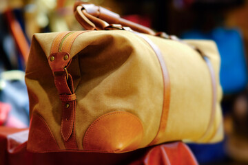A stylish travel sports bag waiting for your next adventure or trip. Background, blur, out of focus, bokeh.