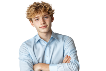 A young man with curly hair in a light blue shirt, looking confidently at the camera with arms crossed.