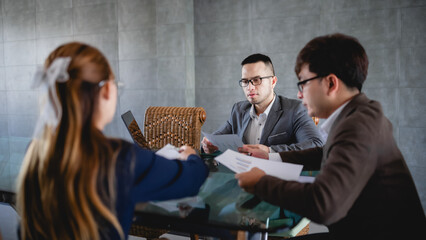 Business people discuss solutions and plan business operations.