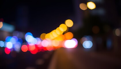Fototapeta premium Nighttime urban landscape city street blurred lights vibrant atmosphere bokeh effect night photography concept