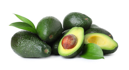 Many whole and cut avocados isolated on white
