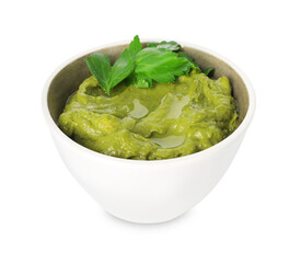 Tasty avocado dip in bowl and parsley isolated on white