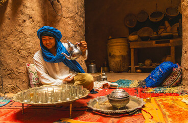Berber serving mint tea in a traditional special ceremony in Morocco