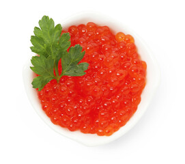 Delicious red caviar with parsley in bowl isolated on white, top view