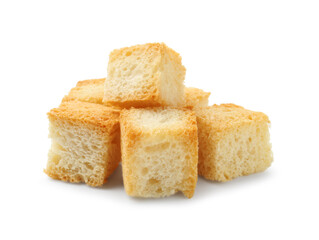 Many delicious crispy croutons isolated on white