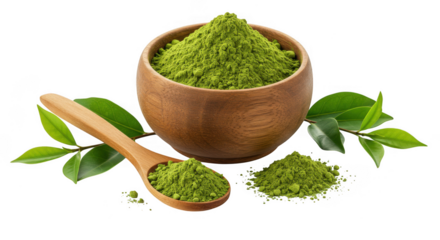 A wooden bowl filled with green matcha powder next to a spoon and some leaves 
