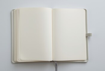 Blank notebook open for writing and creative ideas on a white background  