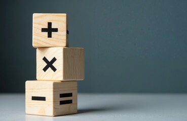 Wooden cubes with math symbols plus minus multiply divide equals. Arithmetic calculation or education concept. Mathematics operation signs for calculating or education. Learning numbers.