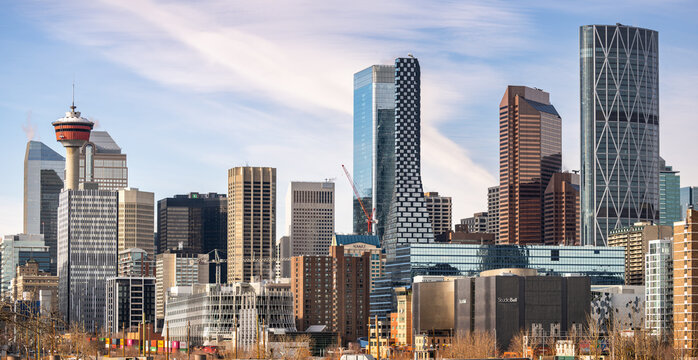 Calgary, Alberta, Canada &ndash; January 30, 2025: Panoramic view of the downtown skyline with some of the iconic buildings during a cold sunny winter day