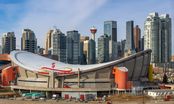 Calgary, Alberta, Canada &ndash; January 30, 2025: Downtown with Scotiabank Saddledome in the foreground. Built in 1983, the dome is set to be replaced by a new arena and event center in the coming years.