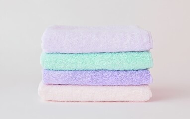 Soft Pastel Towels Stacked Neatly for Relaxation