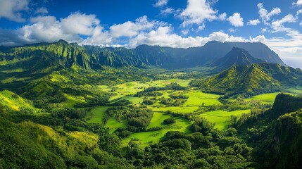 Naklejka premium Lush green valley nestled between towering mountain ranges. 