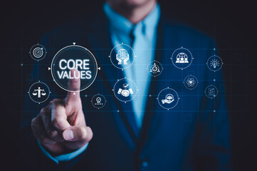 Business Core Values and Organizational Principles Concept. Businessman pointing virtual core values such as integrity, teamwork, accountability, ethics, responsibility, trust, quality, reliability,