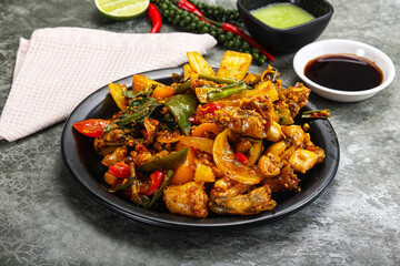 Vietnamese cuisine - fried frog with vegetables