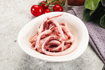 Marinated squid tentacles in the bowl