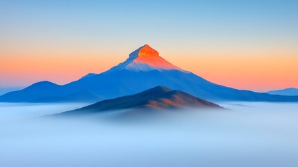 Majestic mountain peak emerging from a sea of clouds at sunset