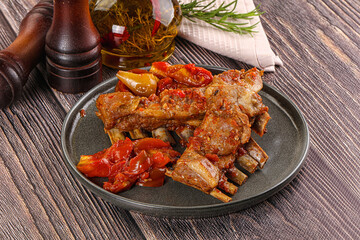 Baked lamb ribs with vegetables