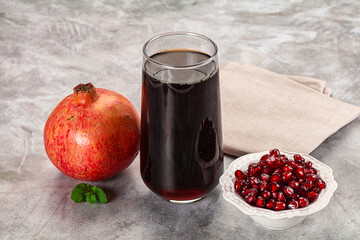 Sweet fresh pomegranate juice with fruit