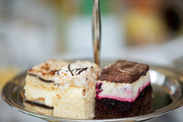 A variety of Assorted Delicacies beautifully arranged on an elegant Silver Platter