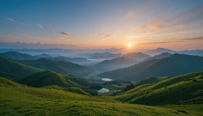 Obraz premium Serene Sunrise over Rolling Green Hills and Tranquil Valley Landscape