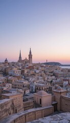Fototapeta premium Serene Sunrise Over Historic Cityscape with Towers and Sea View