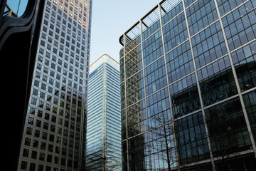 Modern skyscrapers reaching for the sky in canary wharf, london