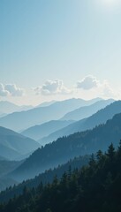 Obraz premium Serene Mountain Landscape with Soft Clouds and Blue Skies