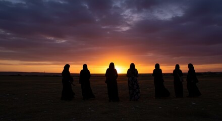 Silhouetted Women in Middle Eastern Mantles