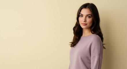 Portrait of a young woman in casual attire with neutral background for lifestyle and fashion design