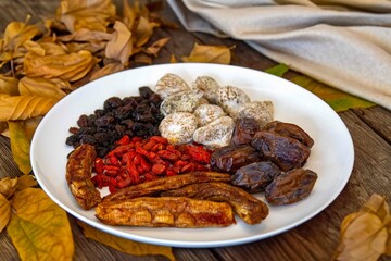 Group of dehydrated dried fruits, dates, goji berries, raisins, dried bananas and Turkish figs. Superfood